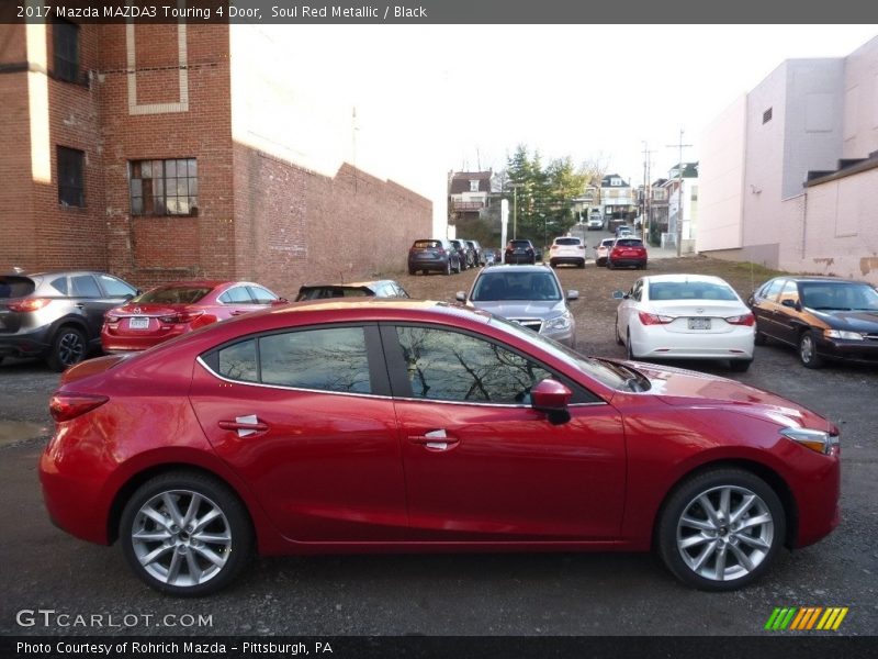 Soul Red Metallic / Black 2017 Mazda MAZDA3 Touring 4 Door