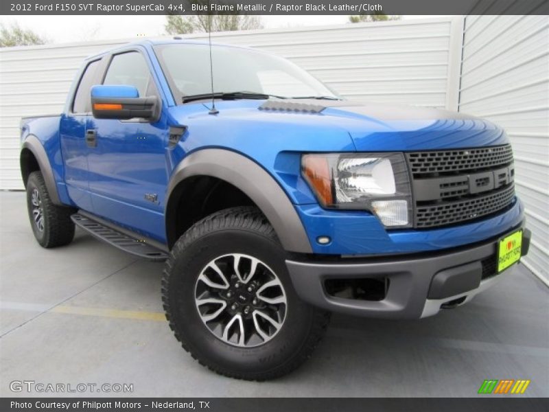 Front 3/4 View of 2012 F150 SVT Raptor SuperCab 4x4