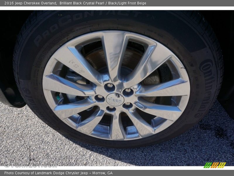 Brilliant Black Crystal Pearl / Black/Light Frost Beige 2016 Jeep Cherokee Overland