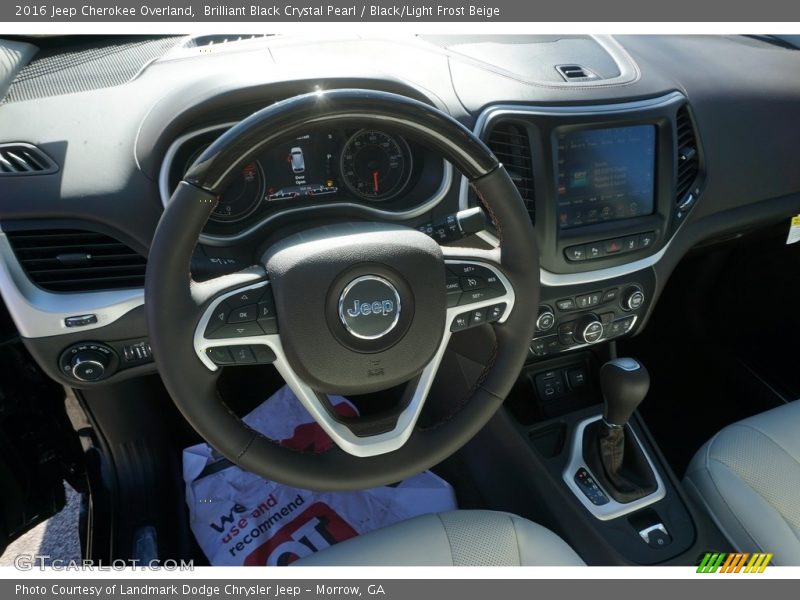 Brilliant Black Crystal Pearl / Black/Light Frost Beige 2016 Jeep Cherokee Overland