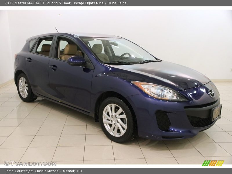 Front 3/4 View of 2012 MAZDA3 i Touring 5 Door