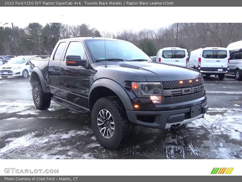 Front 3/4 View of 2013 F150 SVT Raptor SuperCab 4x4