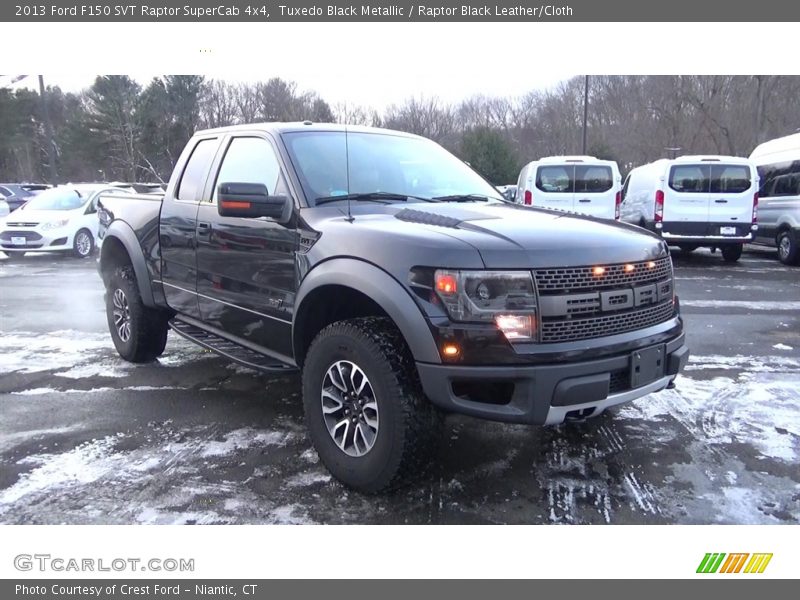 Front 3/4 View of 2013 F150 SVT Raptor SuperCab 4x4