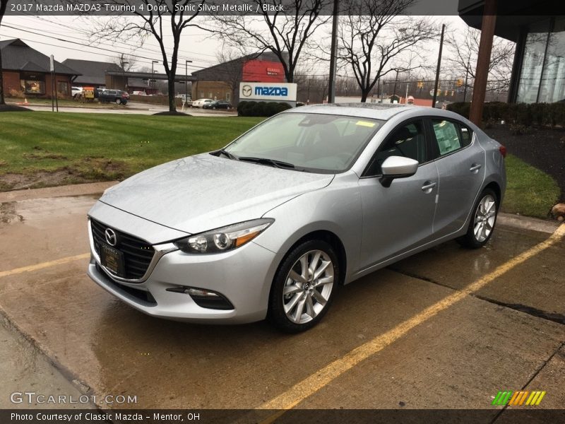 Front 3/4 View of 2017 MAZDA3 Touring 4 Door