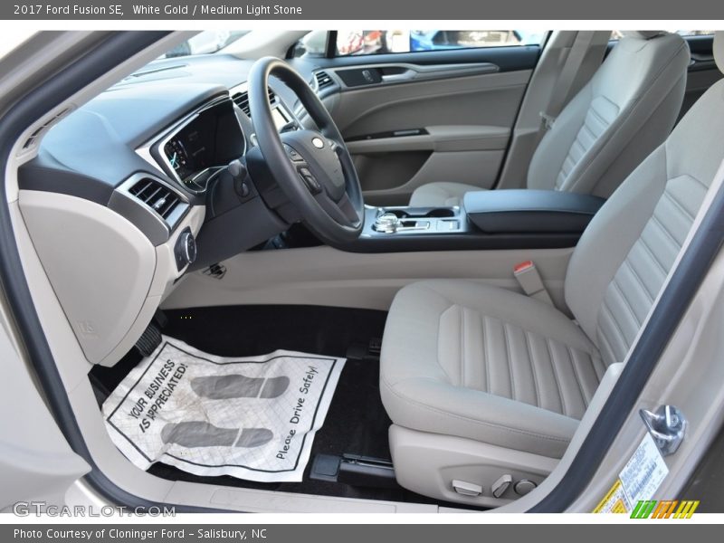  2017 Fusion SE Medium Light Stone Interior