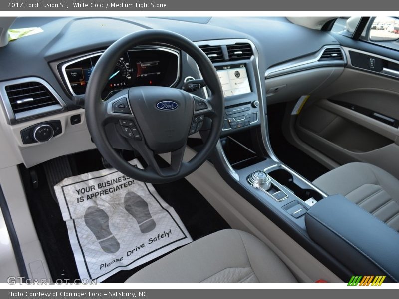  2017 Fusion SE Medium Light Stone Interior