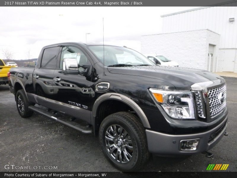 Front 3/4 View of 2017 TITAN XD Platinum Reserve Crew Cab 4x4