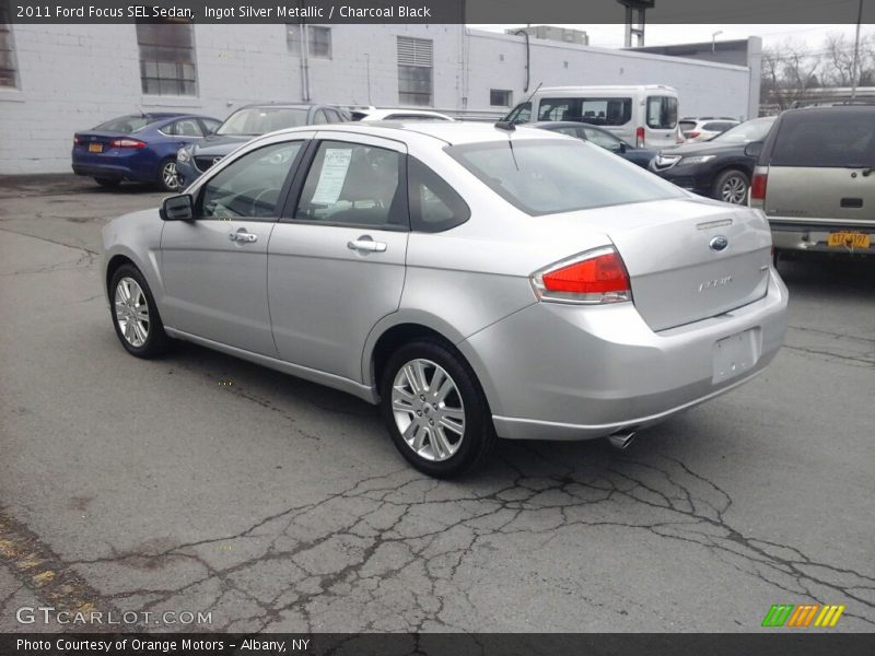 Ingot Silver Metallic / Charcoal Black 2011 Ford Focus SEL Sedan