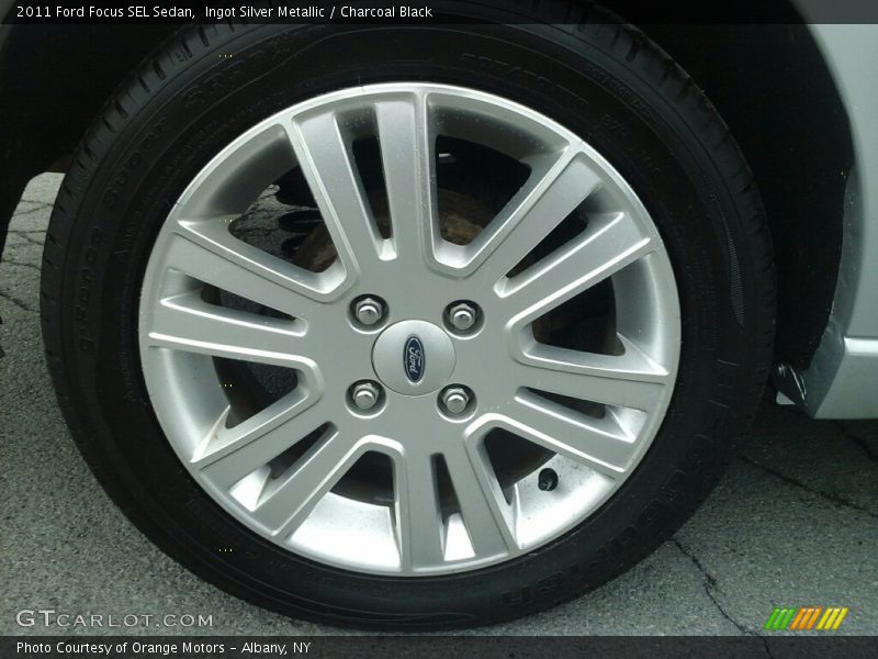 Ingot Silver Metallic / Charcoal Black 2011 Ford Focus SEL Sedan
