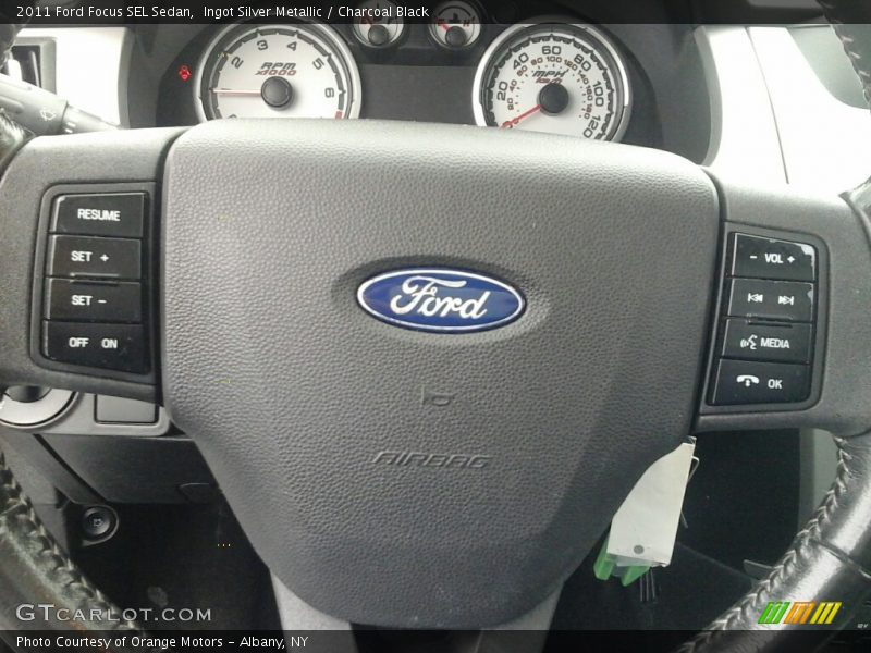 Ingot Silver Metallic / Charcoal Black 2011 Ford Focus SEL Sedan
