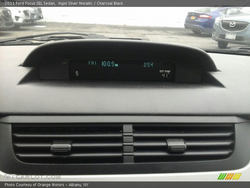 Ingot Silver Metallic / Charcoal Black 2011 Ford Focus SEL Sedan