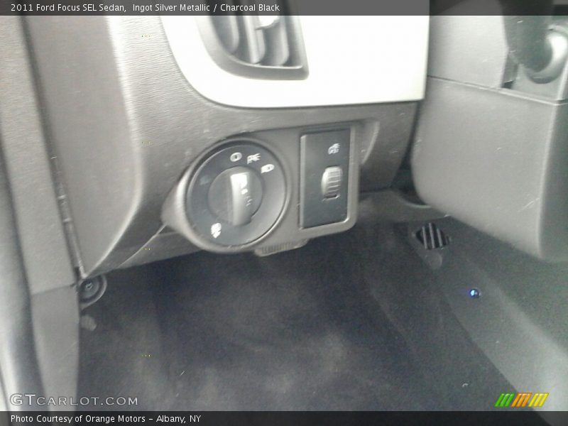 Ingot Silver Metallic / Charcoal Black 2011 Ford Focus SEL Sedan