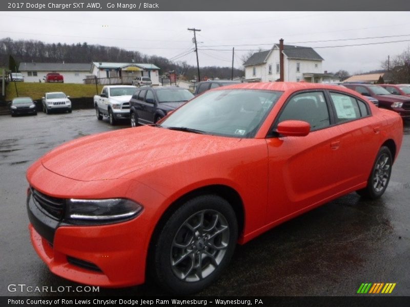 Go Mango / Black 2017 Dodge Charger SXT AWD