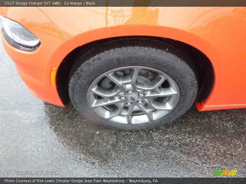 Go Mango / Black 2017 Dodge Charger SXT AWD
