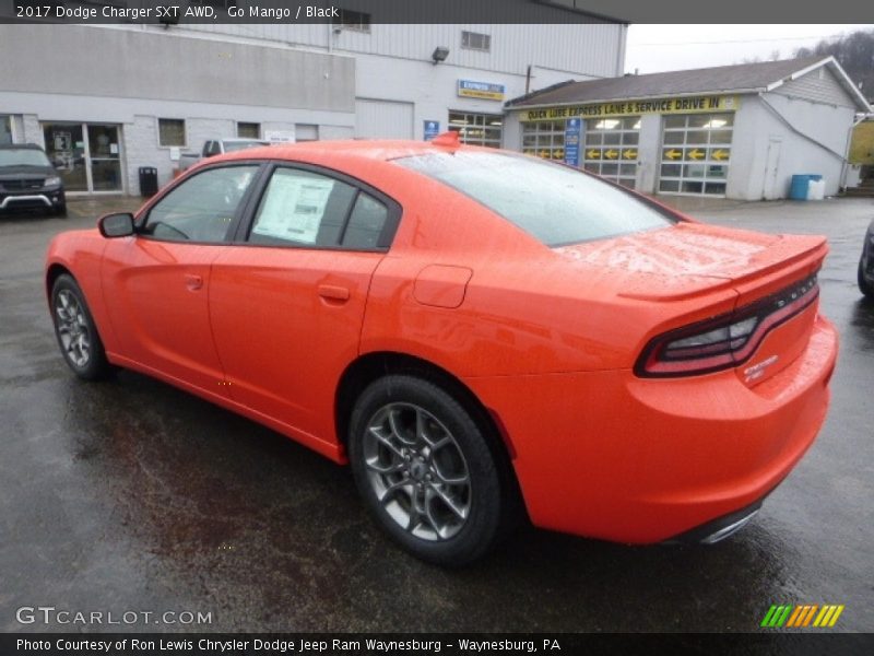 Go Mango / Black 2017 Dodge Charger SXT AWD