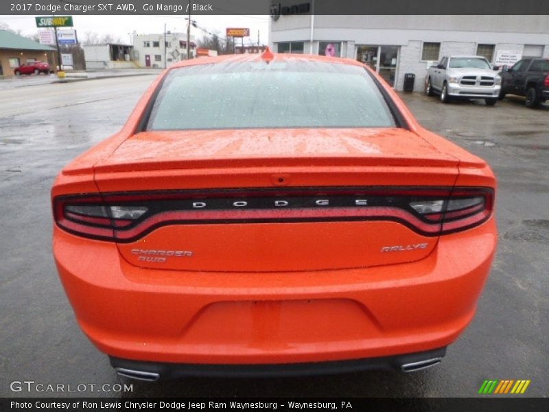 Go Mango / Black 2017 Dodge Charger SXT AWD
