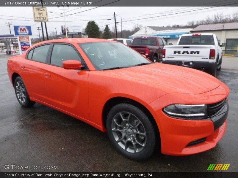 Go Mango / Black 2017 Dodge Charger SXT AWD