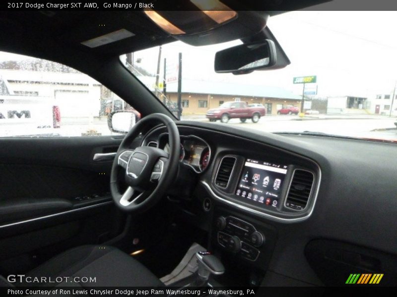 Go Mango / Black 2017 Dodge Charger SXT AWD