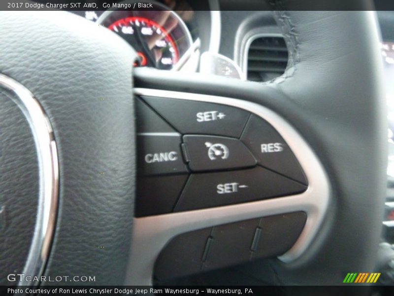 Go Mango / Black 2017 Dodge Charger SXT AWD
