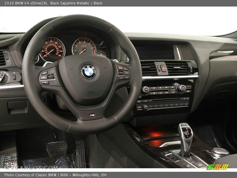 Black Sapphire Metallic / Black 2016 BMW X4 xDrive28i