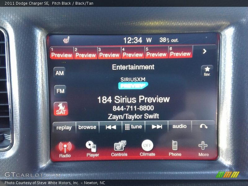 Pitch Black / Black/Tan 2011 Dodge Charger SE