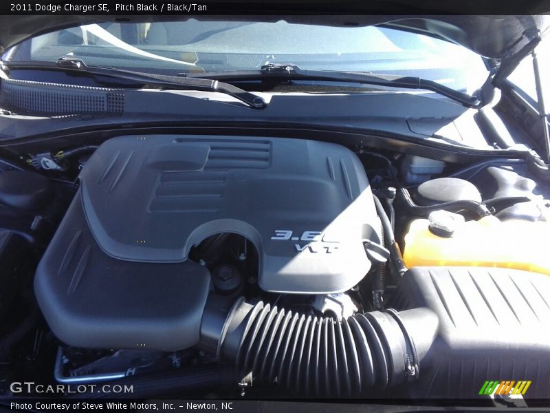 Pitch Black / Black/Tan 2011 Dodge Charger SE