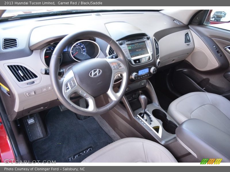 Garnet Red / Black/Saddle 2013 Hyundai Tucson Limited