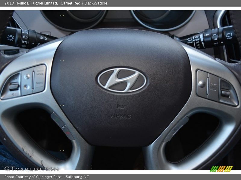 Garnet Red / Black/Saddle 2013 Hyundai Tucson Limited