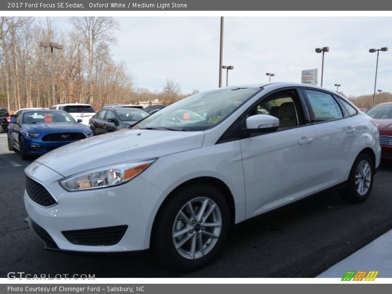 Oxford White / Medium Light Stone 2017 Ford Focus SE Sedan