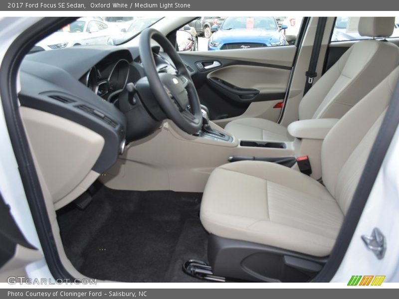 Oxford White / Medium Light Stone 2017 Ford Focus SE Sedan