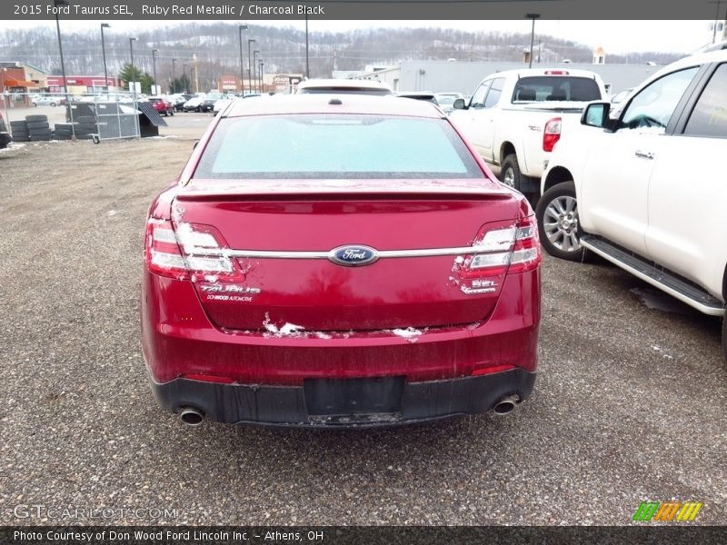 Ruby Red Metallic / Charcoal Black 2015 Ford Taurus SEL