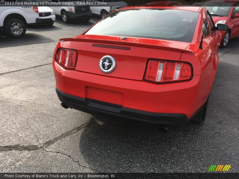 Race Red / Stone 2011 Ford Mustang V6 Premium Coupe