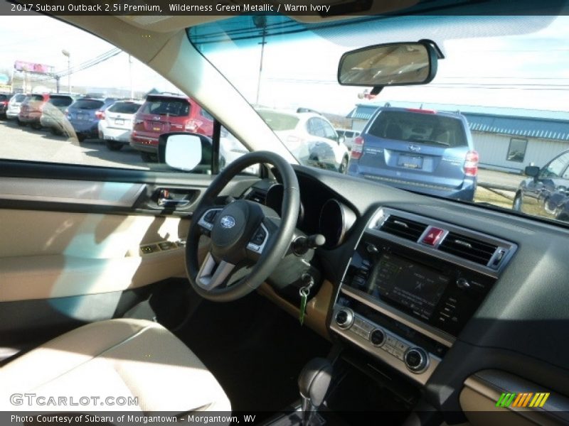 Wilderness Green Metallic / Warm Ivory 2017 Subaru Outback 2.5i Premium