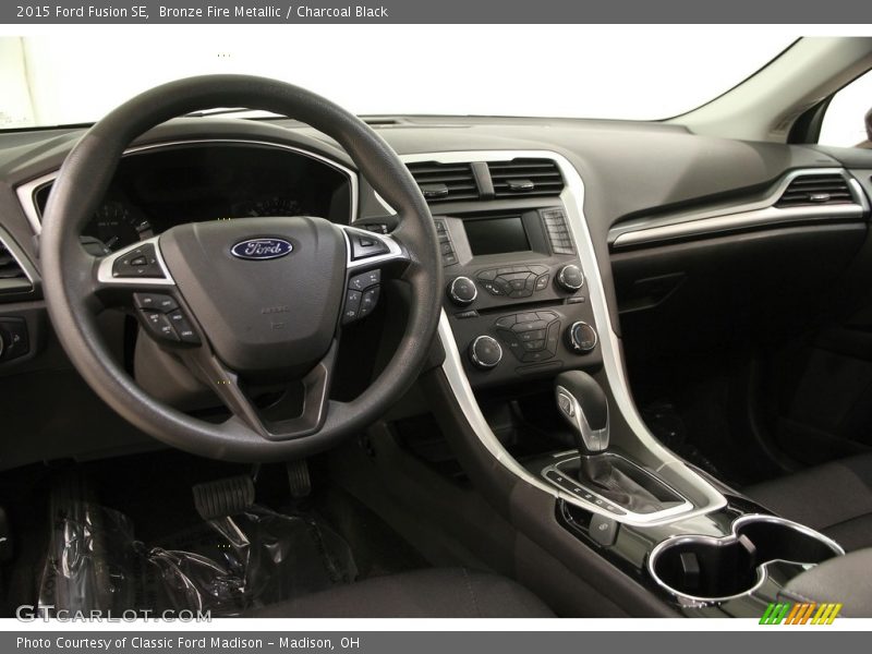 Bronze Fire Metallic / Charcoal Black 2015 Ford Fusion SE