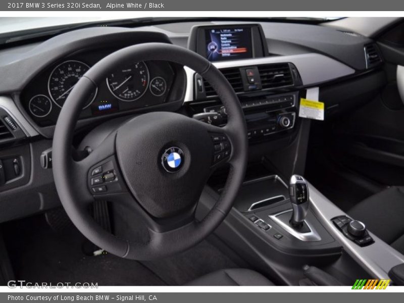 Alpine White / Black 2017 BMW 3 Series 320i Sedan