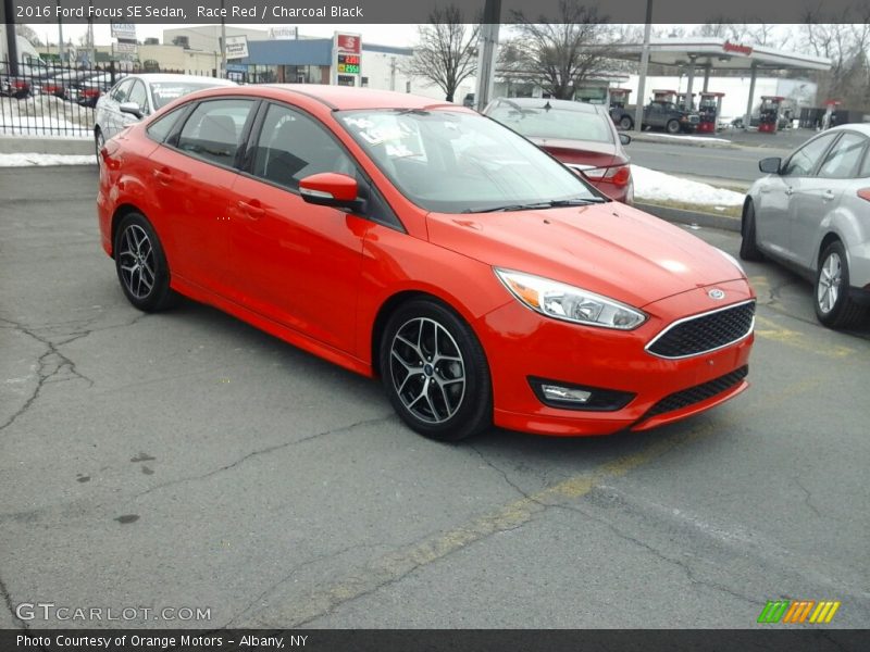 Race Red / Charcoal Black 2016 Ford Focus SE Sedan