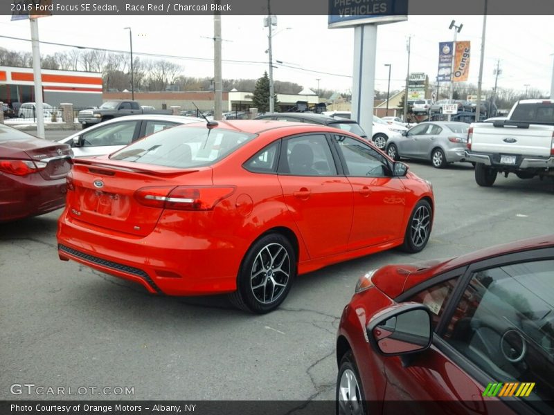Race Red / Charcoal Black 2016 Ford Focus SE Sedan
