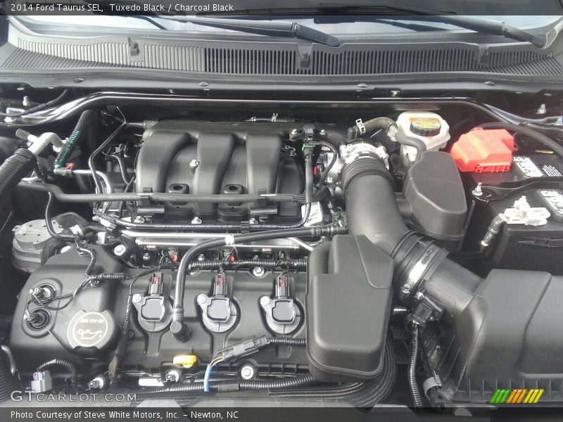 Tuxedo Black / Charcoal Black 2014 Ford Taurus SEL