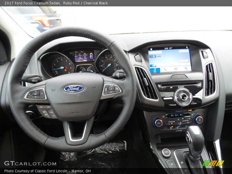 Ruby Red / Charcoal Black 2017 Ford Focus Titanium Sedan