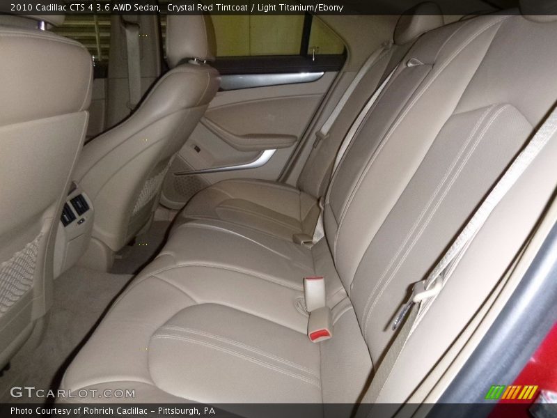 Crystal Red Tintcoat / Light Titanium/Ebony 2010 Cadillac CTS 4 3.6 AWD Sedan