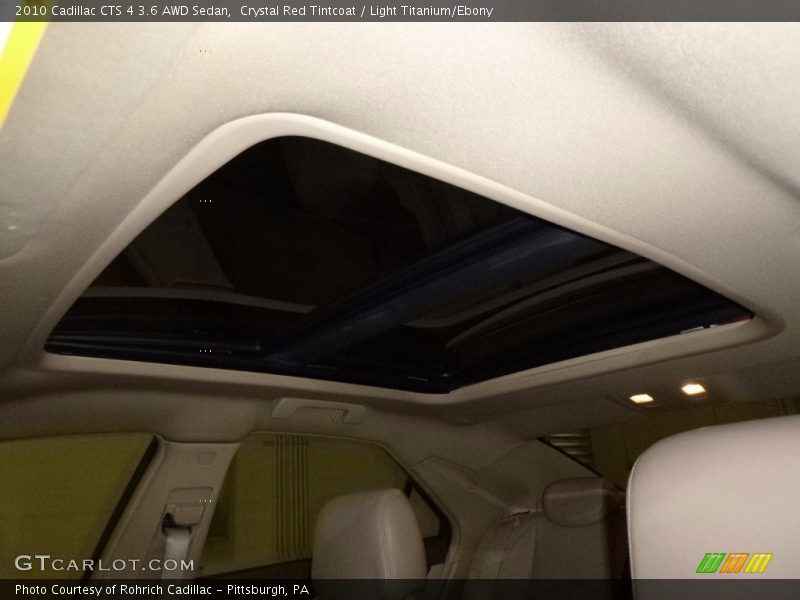 Crystal Red Tintcoat / Light Titanium/Ebony 2010 Cadillac CTS 4 3.6 AWD Sedan