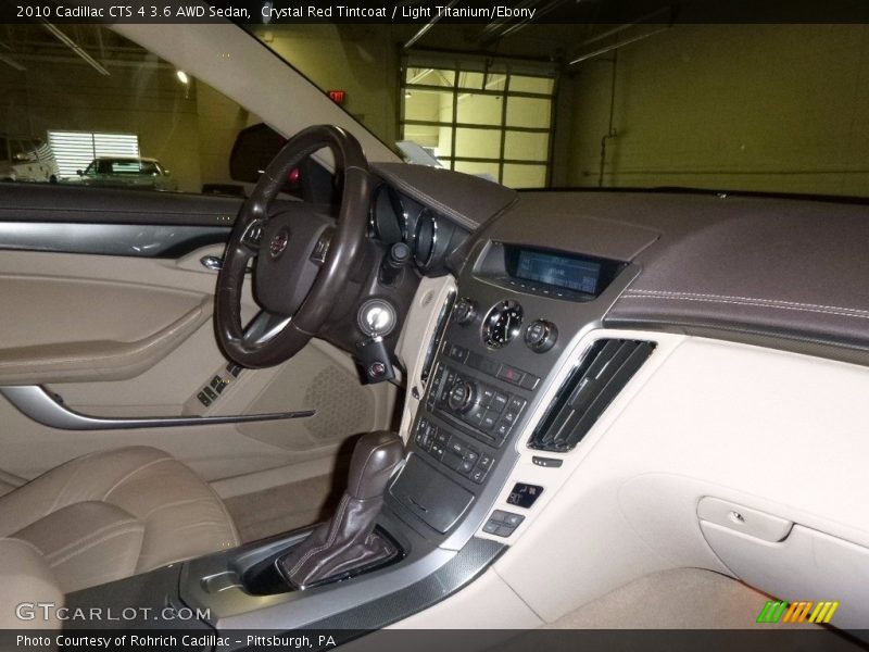 Crystal Red Tintcoat / Light Titanium/Ebony 2010 Cadillac CTS 4 3.6 AWD Sedan