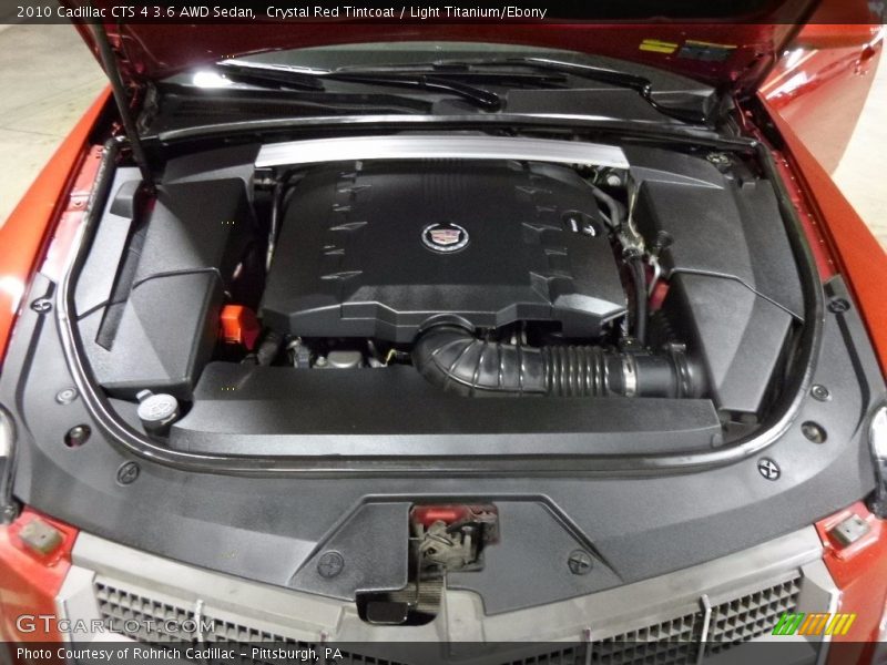 Crystal Red Tintcoat / Light Titanium/Ebony 2010 Cadillac CTS 4 3.6 AWD Sedan