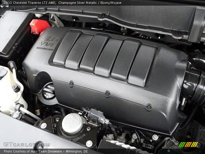 Champagne Silver Metallic / Ebony/Mojave 2013 Chevrolet Traverse LTZ AWD