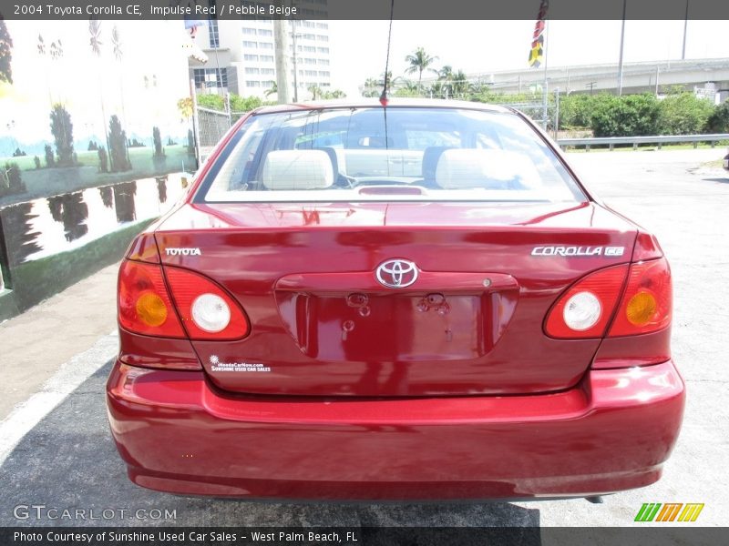 Impulse Red / Pebble Beige 2004 Toyota Corolla CE