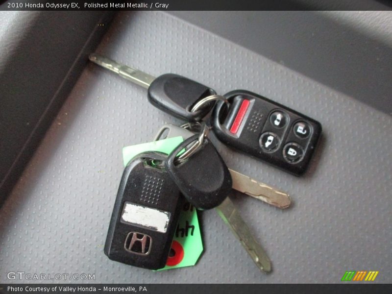 Polished Metal Metallic / Gray 2010 Honda Odyssey EX