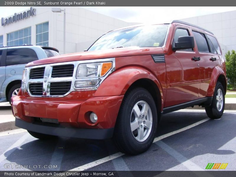 Sunburst Orange Pearl / Dark Khaki 2009 Dodge Nitro SE