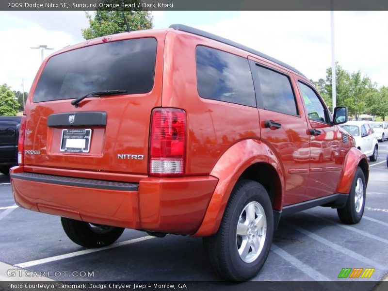 Sunburst Orange Pearl / Dark Khaki 2009 Dodge Nitro SE