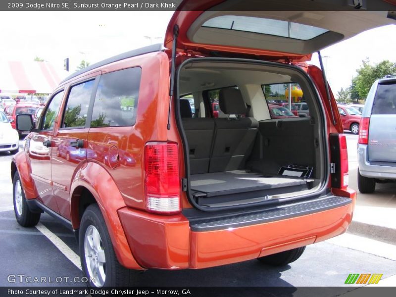 Sunburst Orange Pearl / Dark Khaki 2009 Dodge Nitro SE