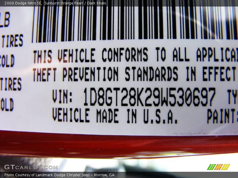 Sunburst Orange Pearl / Dark Khaki 2009 Dodge Nitro SE